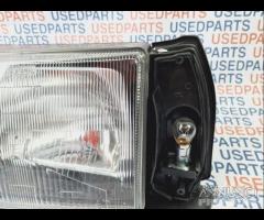 Faro lato guida lancia Y 10 1990 nuovo originale