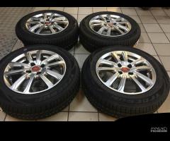 Cerchi in lega 15 Fiat grande punto gomme 4 season