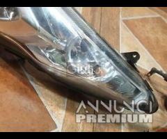 SUZUKI BURGMAN 400 K7-9 FARO ANTERIORE SINISTRO HE