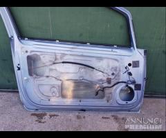 Porta lato guida opel corsa D celeste anno 2009 - 27