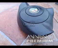 735289920 AIRBAG VOLANTE ALFA ROMEO 147 1° ae01334