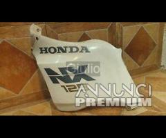 CARENA FIANCATA ANTERIORE SINISTRA  HONDA NX TRANS