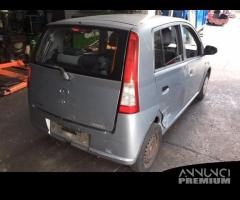 Ricambi Daihatsu Cuore 2004 1000cc benzina grigia