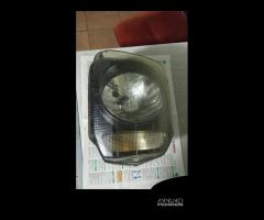 Faro sx Suzuki Jimn