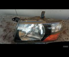 Faro Sx Dx Pajero 2000-2007