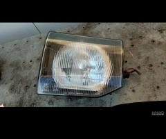 Faro anteriore dx sx Mitsubishi Pajero