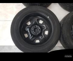 Cerchi Gomme Copricerchi Peugeot 2008 - 14