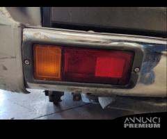 Fanale post sx paraurti MITSUBISHI PAJERO 1998