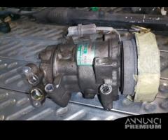 Compres clima NISSAN MICRA 1461cc diesel del 2004