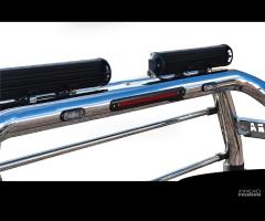 Nissan Navara D40 Roll bar inox con protez.cabina