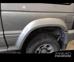 Modanatura post sinistra MITSUBISHI PAJERO 1997