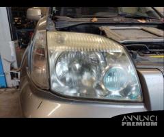 Proiettore destro NISSAN X-TRAIL del 2005