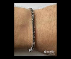 BRACCIALE TENNIS ORO 18kt. DIAMANTI NERI E BIANCHI