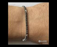 BRACCIALE TENNIS ORO 18kt. DIAMANTI NERI E BIANCHI